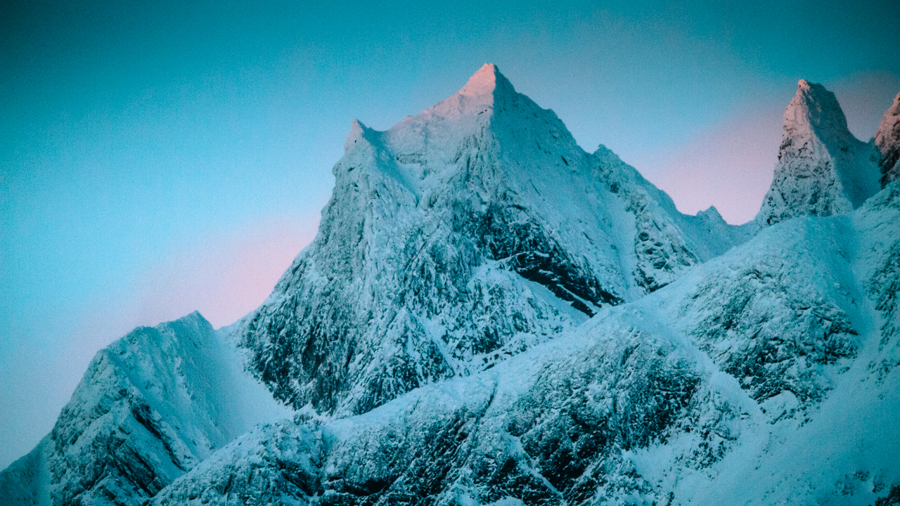 A rocky cliff in Haines, Alaska, interrupts a late-morning sunrise.